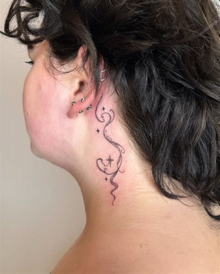 Exquisite Small Behind-the-Ear Tattoos: A Discrete Elegance