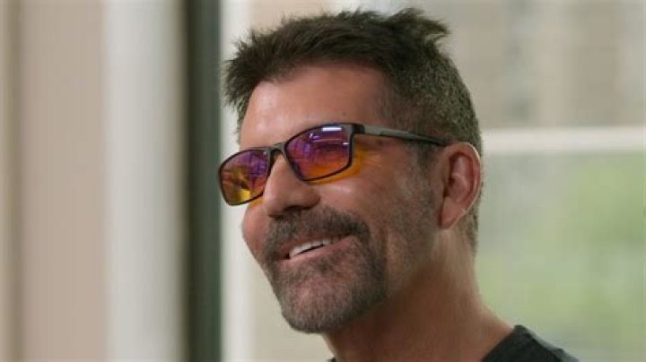 The Tragic Details: What Really Happened To Simon Cowell's Son