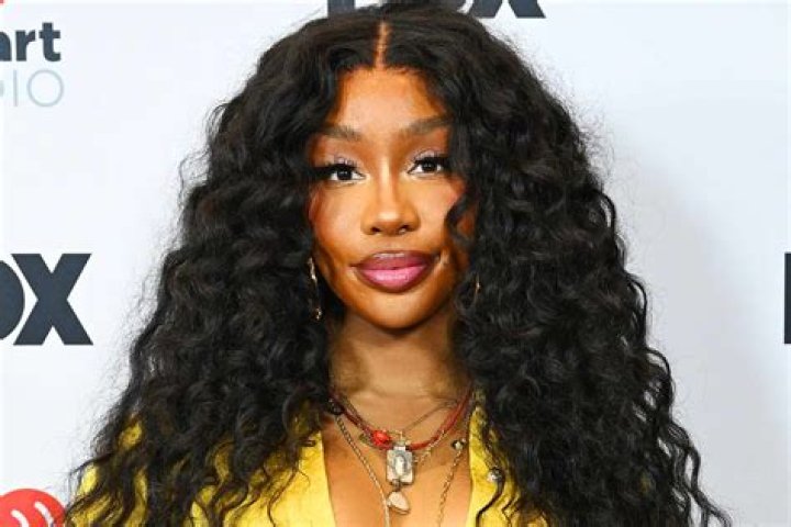 Unraveling The Enigmatic Height Of SZA: A Tall Tale